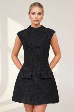 Black textured mini dress with round neck and cap sleeves, peplum-style waist, flap pockets