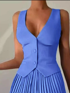 Light blue button-up vest with pleated mini skirt detail