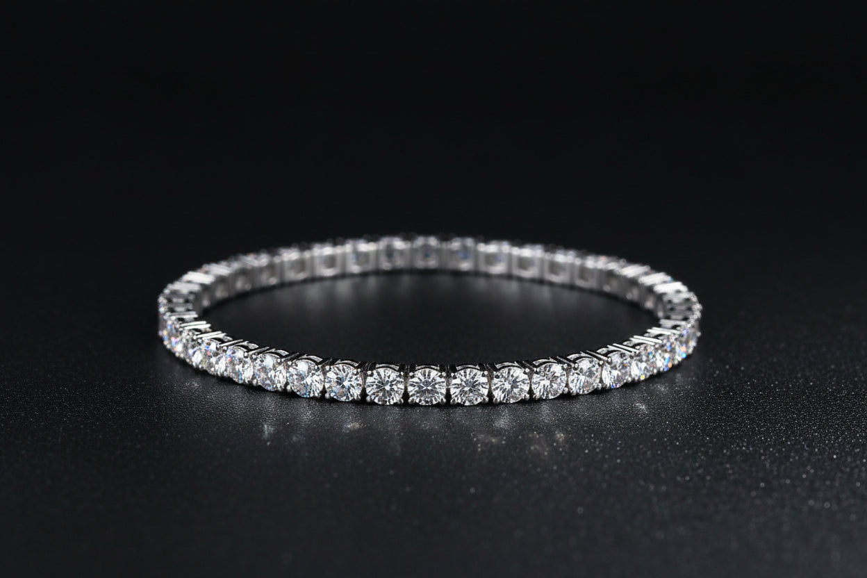 Silver bracelet on a dark textured surface 