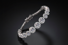 Silver bracelet on a black background