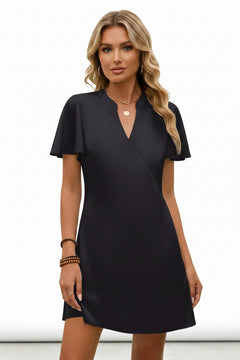 Black mini dress with V-neck, notched front, and flutter sleeves