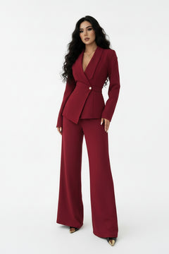 One-button blazer and wide-leg pants set in burgundy, styled with a fitted waist and lapels.