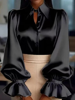 Black satin button-up blouse with pointed collar and gathered flounce sleeves