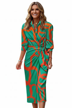 Green printed collared shirt dress with waist tie and 3/4 sleeves.
