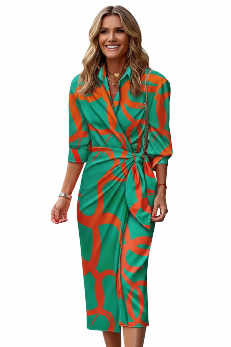 Green printed collared shirt dress with waist tie and 3/4 sleeves.