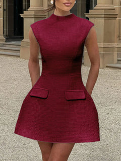 Wine red textured mini dress, round neck, cap sleeves, flared skirt, front flap pockets