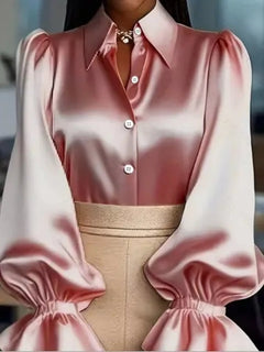 Pink satin blouse with pointed collar and ruched flounce cuffs at wrists
