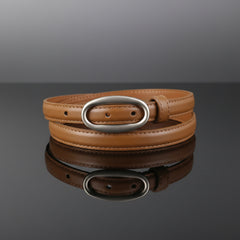 Tan skinny leather belt with oval metal buckle and punched strap holes