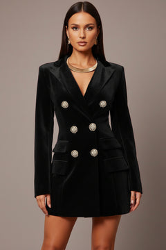 Black velvet double-breasted blazer dress with gold buttons, notched lapels, long sleeves