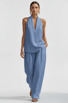 Sky blue halter neck top and wide-leg pants set with flowing drape V neckline