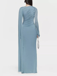 Blue ruched draped long-sleeve maxi dress, back view with diagonal ruching