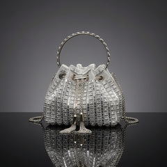Rhinestone bucket crossbody bag in silver with drawstring-style top and chain straps