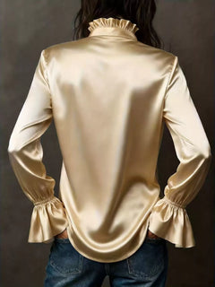 Light satin button-up blouse back view with gathered flounce cuffs