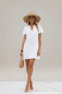 White satin mini dress with V-neck and flutter sleeves, straight mini hem