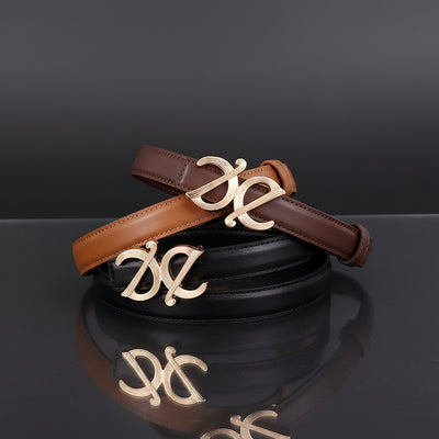 Caramel leather belt with ornate metallic buckle, stitched strap and punched holes