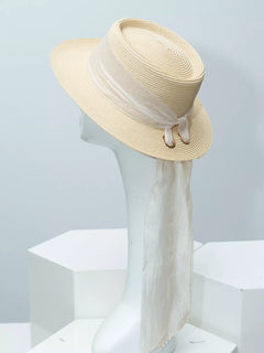Ribbon-accent straw sun hat in ivory with white ribbon band and long drape ties