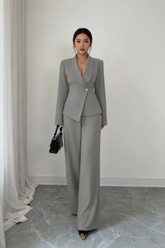 Gray one-button blazer and pants set, notched lapel jacket and matching wide-leg trousers.