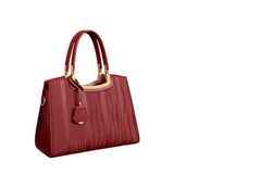 Red leather top-handle handbag with gold hardware and structured rectangular silhouette
