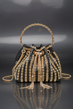 Rhinestone bucket crossbody bag in black with gold-toned trim and chain straps