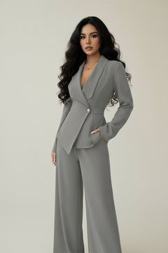 Gray one-button blazer and pants set with notched lapel, button front, and wide-leg trousers.
