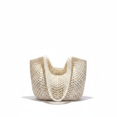 Woven straw hobo bag in rice white, open top with woven handles and structured basket form
