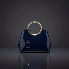 Indigo glossy ring-handle handbag with gold-toned oval ring handle
