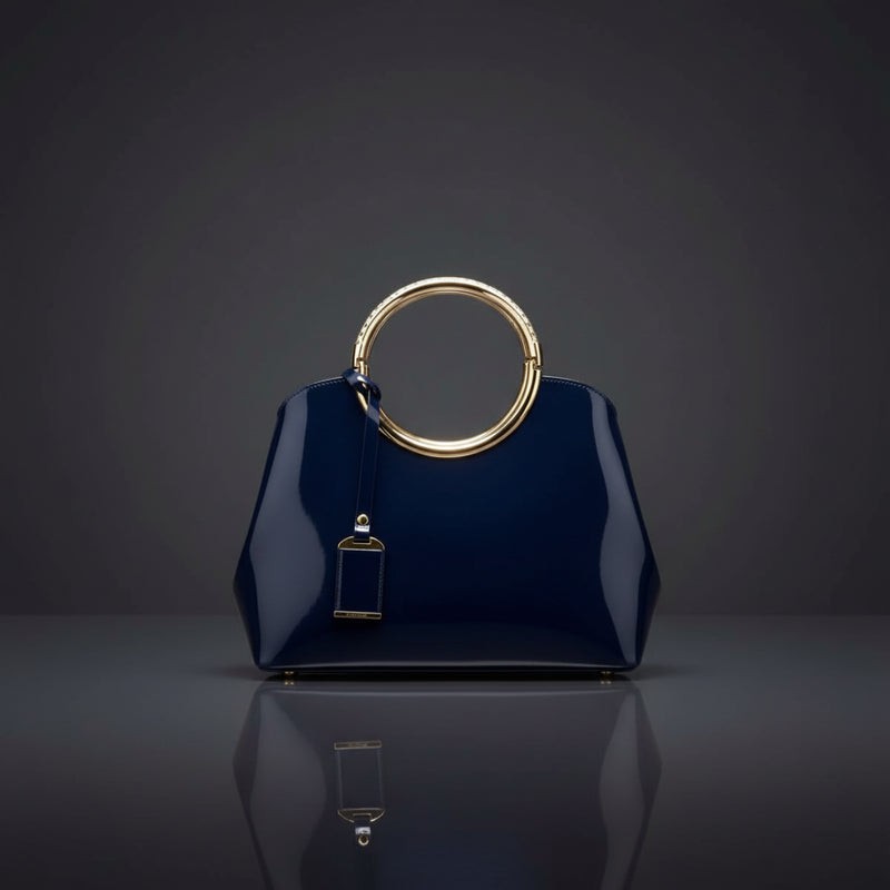 Indigo glossy ring-handle handbag with gold-toned oval ring handle