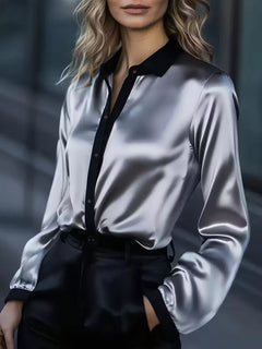 Light gray satin button-up long sleeve blouse with black collar and placket