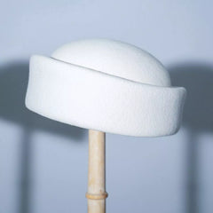 White wool pillbox hat with flat crown and short brim
