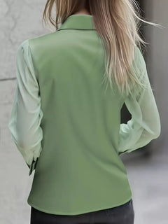Green satin button-up blouse back view with long sleeves and clean neckline