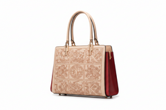 Apricot leather top-handle handbag with embossed front panels and burgundy side trim