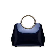 Dark indigo glossy handbag with round gold ring top handle