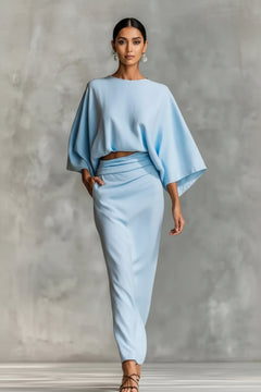 Light blue kimono-sleeve top and ruched midi skirt set with relaxed drape