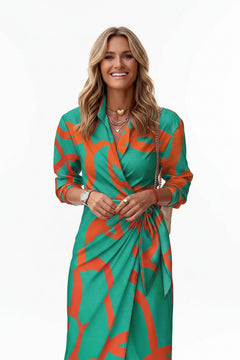 Green printed collared shirt dress with V-neck placket, waist tie, 3/4 sleeves.
