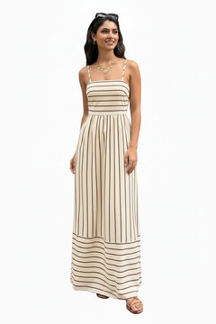 Apricot striped maxi dress with spaghetti straps, sleeveless bodice and full skirt hem detail