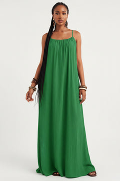 Green spaghetti strap flowy maxi dress with gathered square neckline