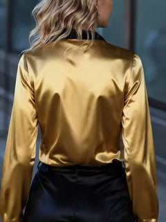 Gold satin button-up long sleeve blouse, back view