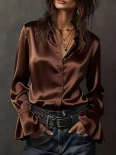 Brown satin button-up blouse with button front and flounce sleeve cuffs
